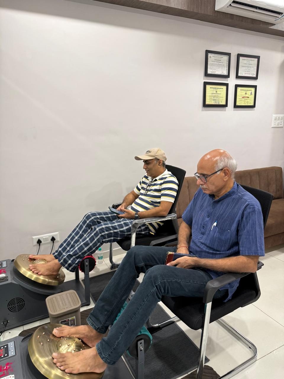 Kansa Thali foot massage in progress