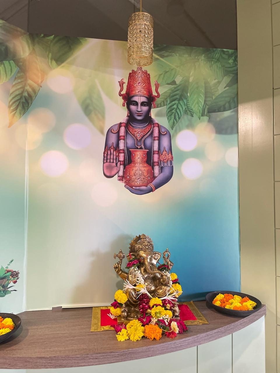 Dhanvantari — the deity of Ayurveda and Ganpati - Vignaharta, at our entrance